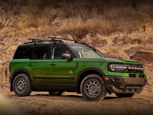 2024 Ford Bronco Sport exterior side view of vehicle parked in a rocky area